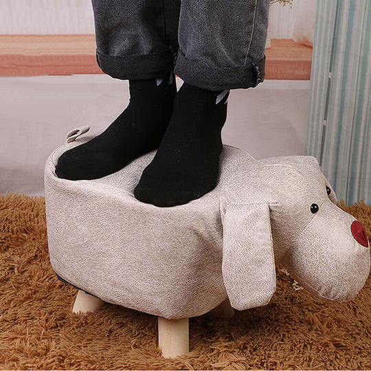 Child standing on a cute dog-shaped stool, showcasing affordable homewares and quality, value furniture for kids.