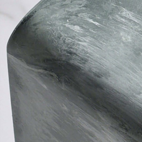 Close-up of a smooth, grey marble texture on a quality value furniture piece from an affordable homewares collection.