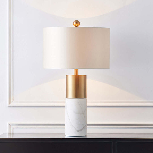 Stylish table lamp with marble base and gold accent, perfect for adding affordable, quality, and value homewares to any room.