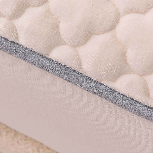 Affordable quality homewares and value furniture showcasing a soft, textured mattress cover with a quilted pattern and durable edging.