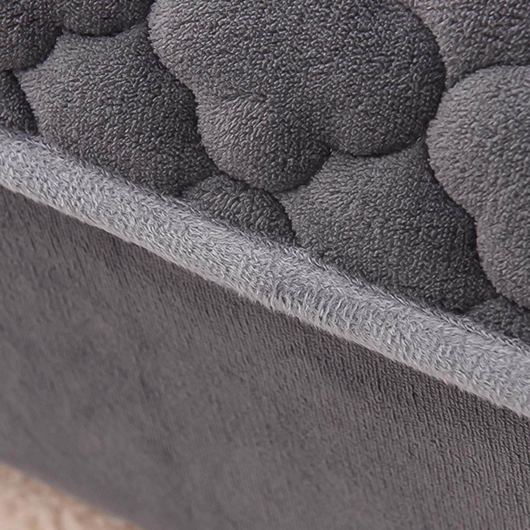 Close-up of grey textured quality fabric used in affordable homewares and value furniture.