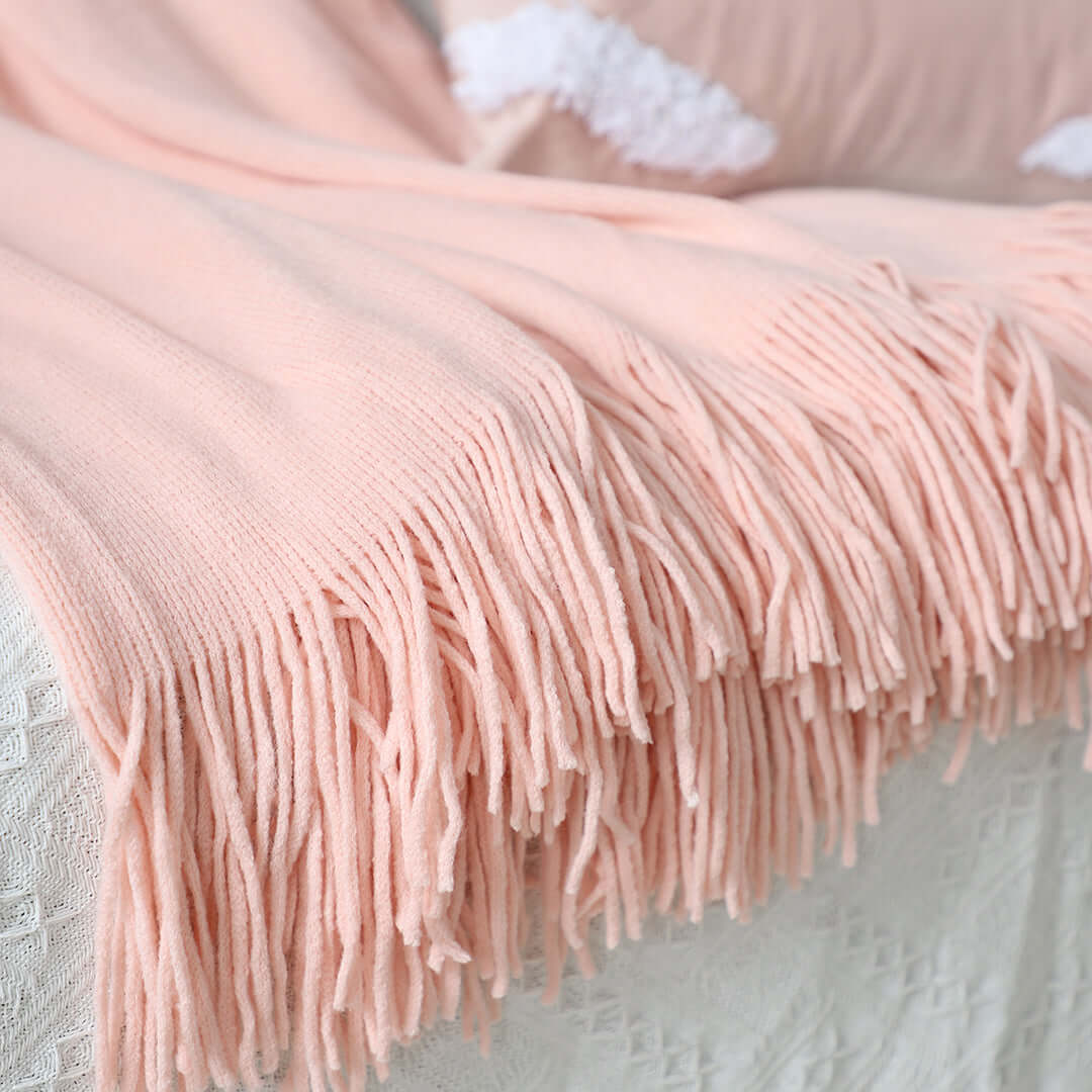 Affordable quality homewares - soft pink fringed throw blanket for value furniture.