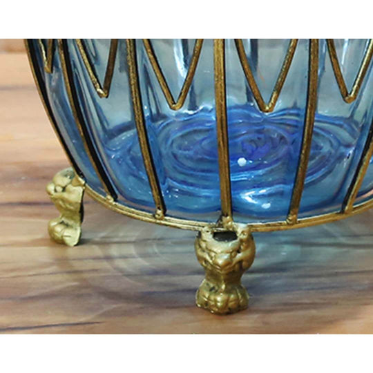 Blue glass decorative bowl with gold metal accents and claw feet for affordable homewares, quality craftsmanship, and value furniture.