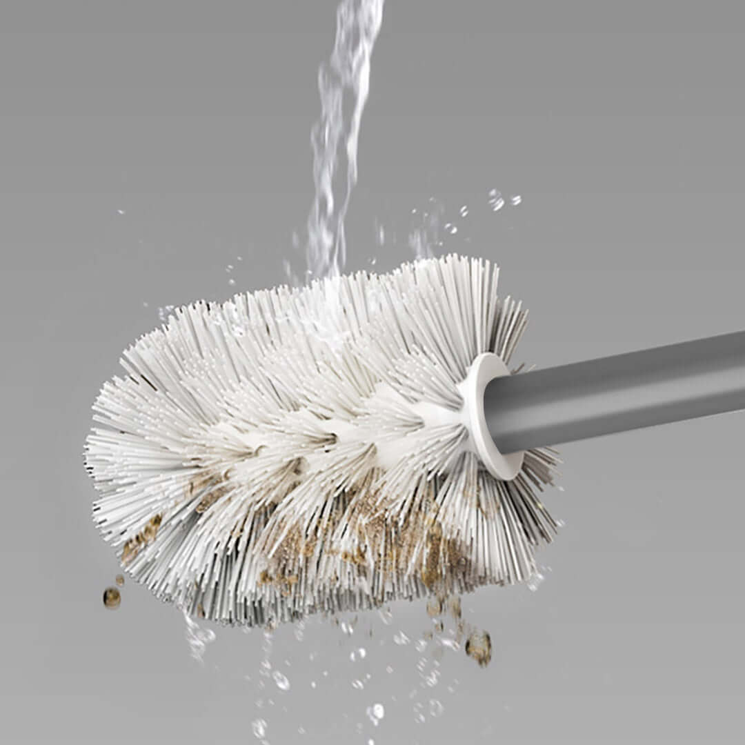 Toilet brush being rinsed under water, demonstrating effective cleaning for affordable homewares and quality value furniture maintenance