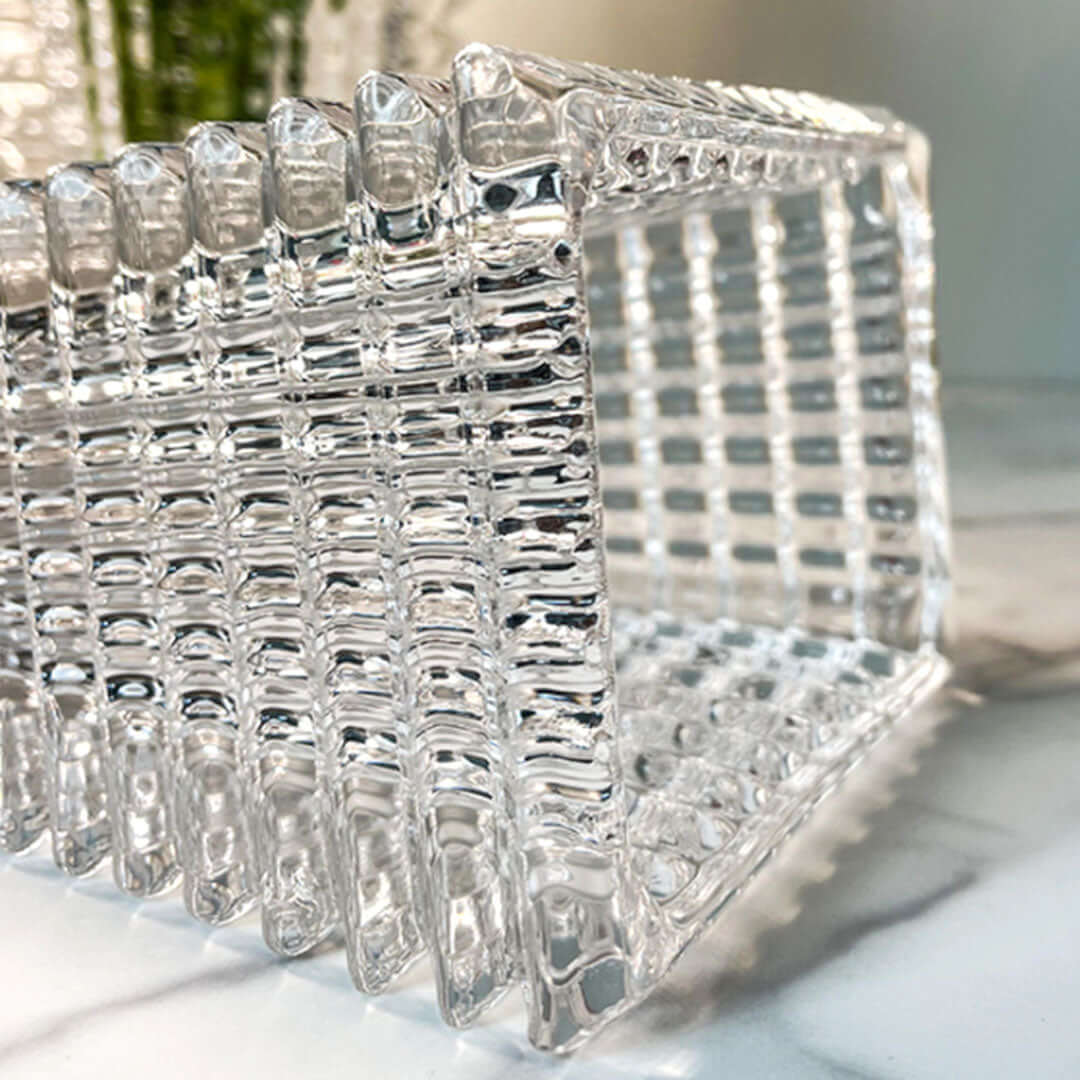 Affordable quality glass homeware showcasing intricate design and reflecting value furniture aesthetics