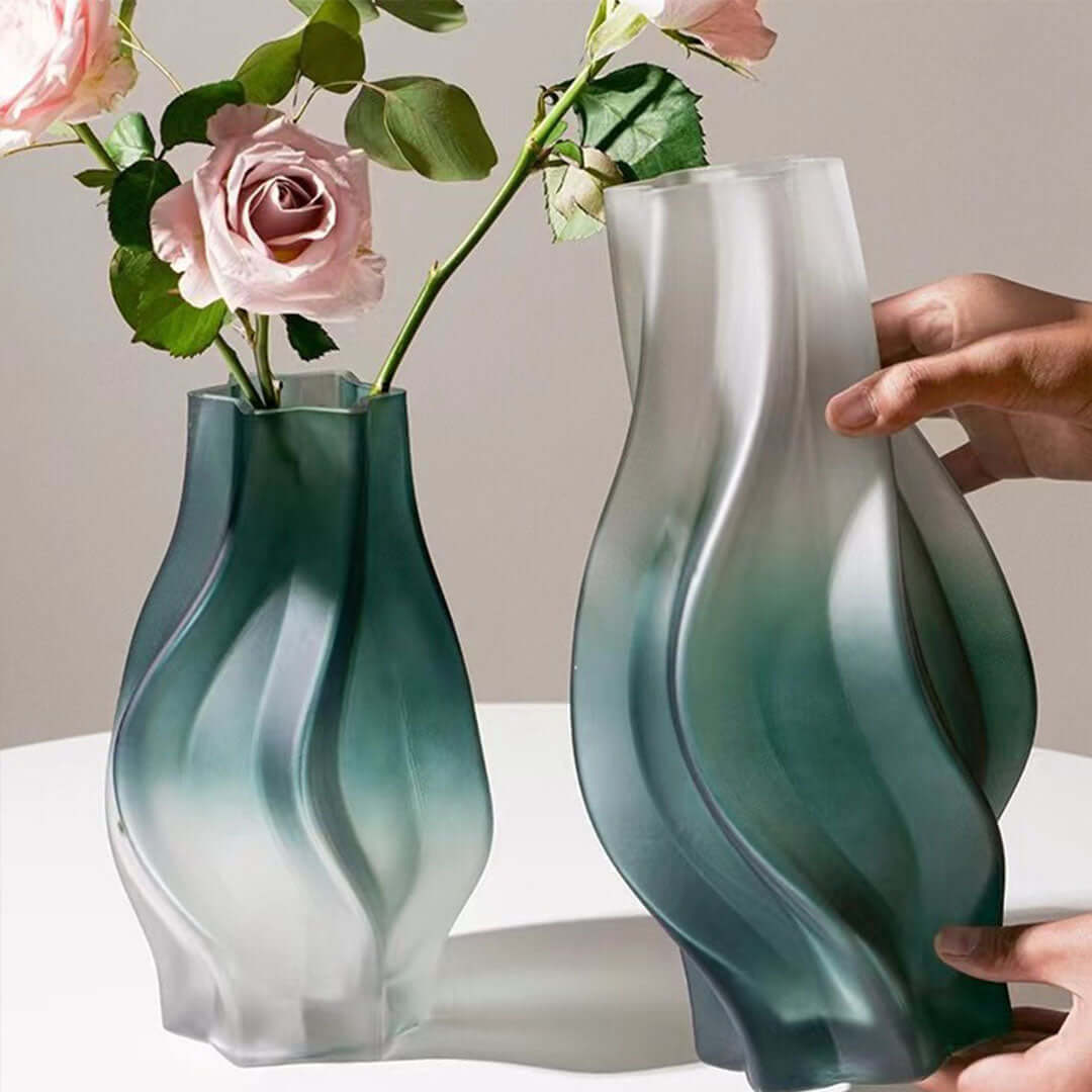 Modern green and white vases with flowers, exemplifying affordable quality homewares and value furniture decor.