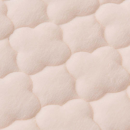 Close-up of soft, cloud-patterned fabric emphasizing quality and affordable homewares and value furniture offerings.