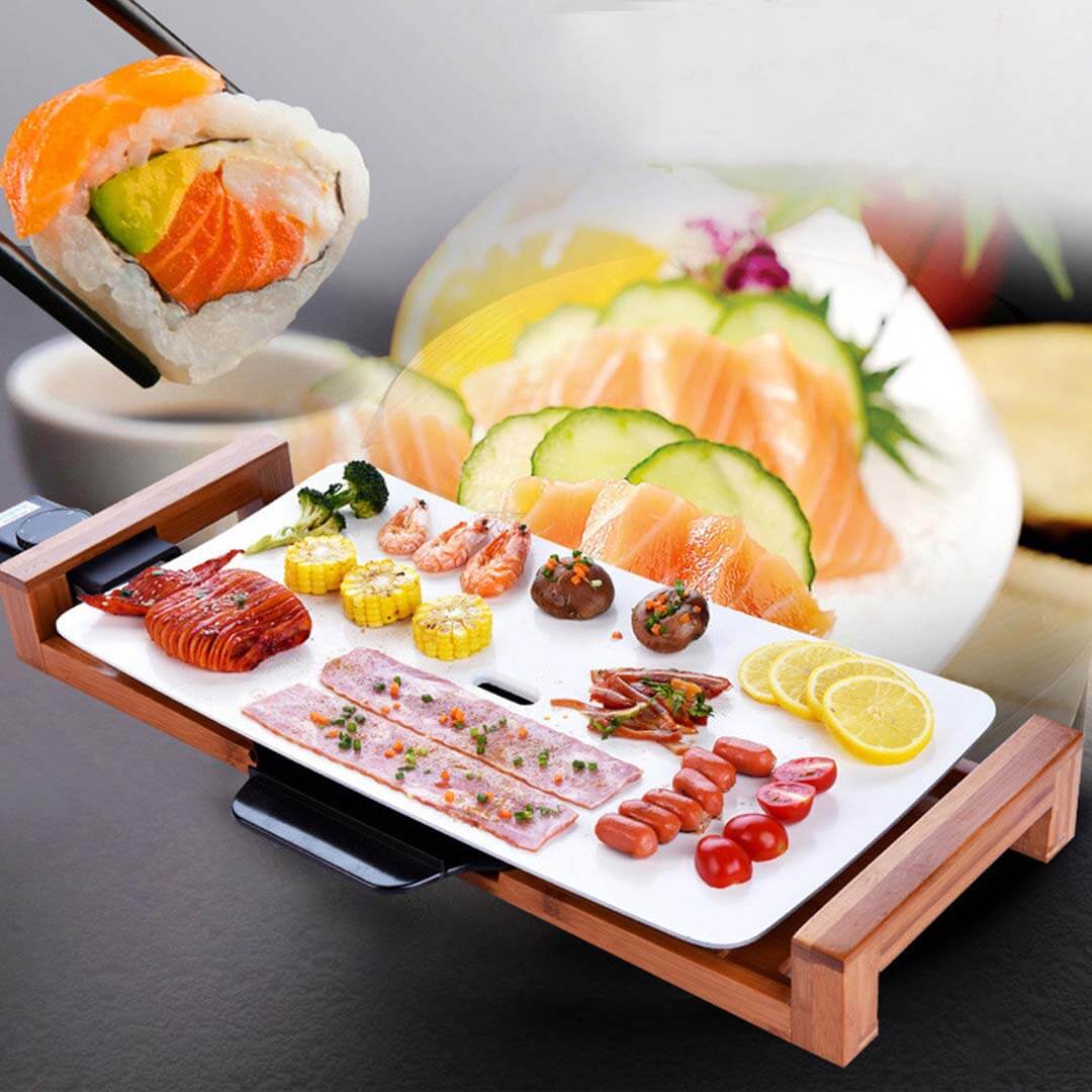 Sushi and sliced seafood displayed on a wooden platter with garnish, lemons, and vegetables.