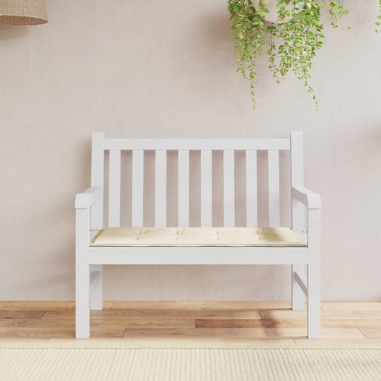 Affordable quality garden bench cushion in cream color, made from durable Oxford fabric, measuring 100x50x3 cm, placed on white bench