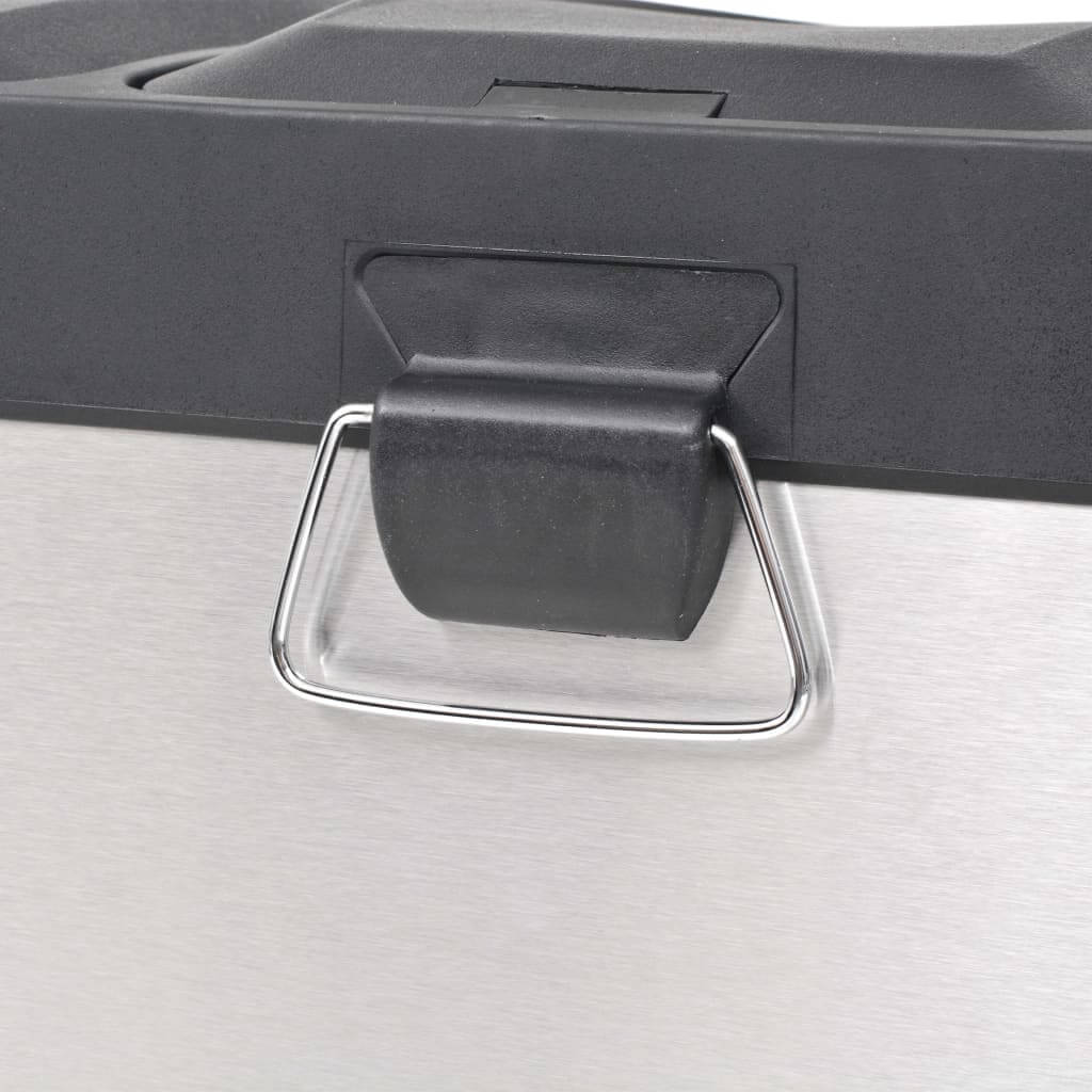 Close-up of handle on stainless steel recycling pedal bin with soft-close lids, budget-friendly and high quality for sorting waste.