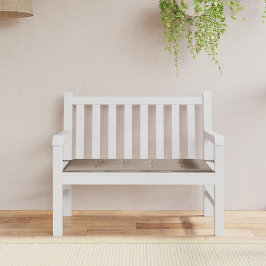 White garden bench with taupe cushion in Oxford fabric, offering affordable quality and comfort for outdoor spaces.