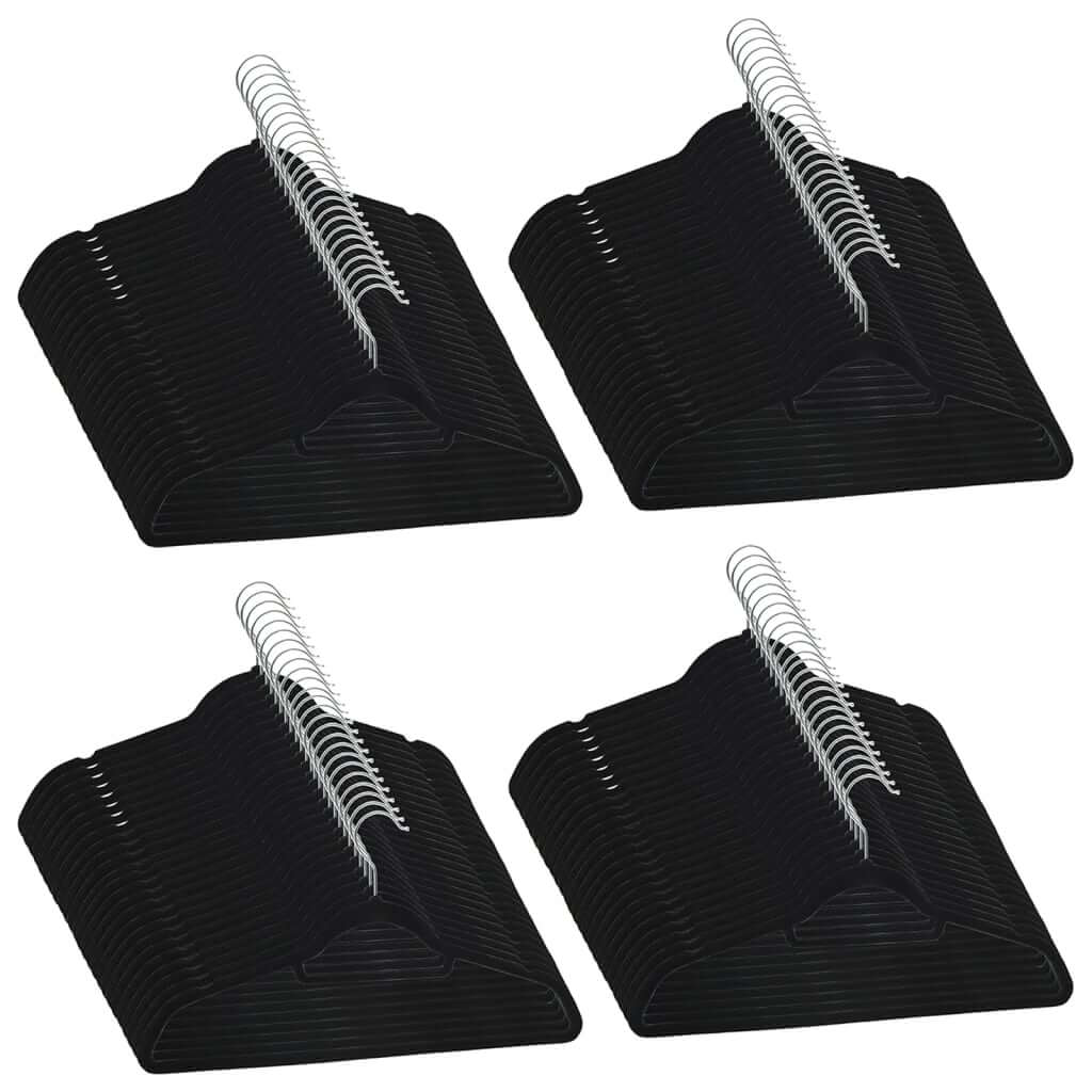 Affordable 100 pcs black velvet anti-slip clothes hanger set with metal hooks, featuring grooves for secure clothing organization.