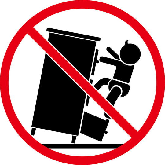 Warning sign against climbing on furniture to prevent tipping accidents.