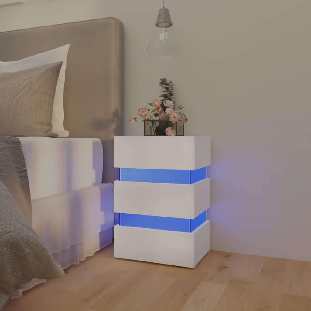 Affordable quality LED bedside cabinet in white engineered wood with ample storage space, providing value and convenience in your bedroom