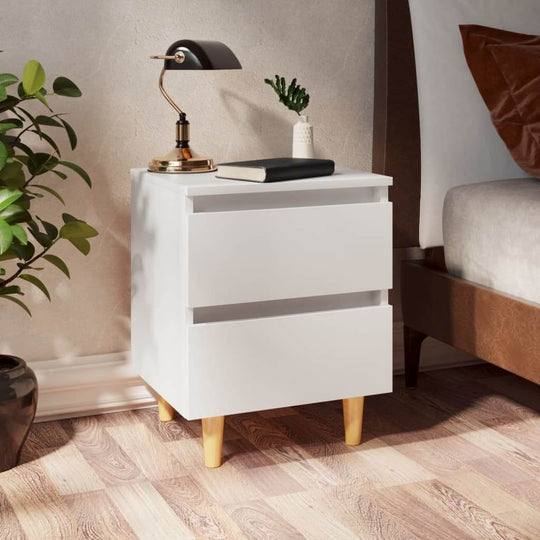 Affordable quality bed cabinet with solid pinewood legs and two drawers in white, perfect for Scandinavian-style interiors.