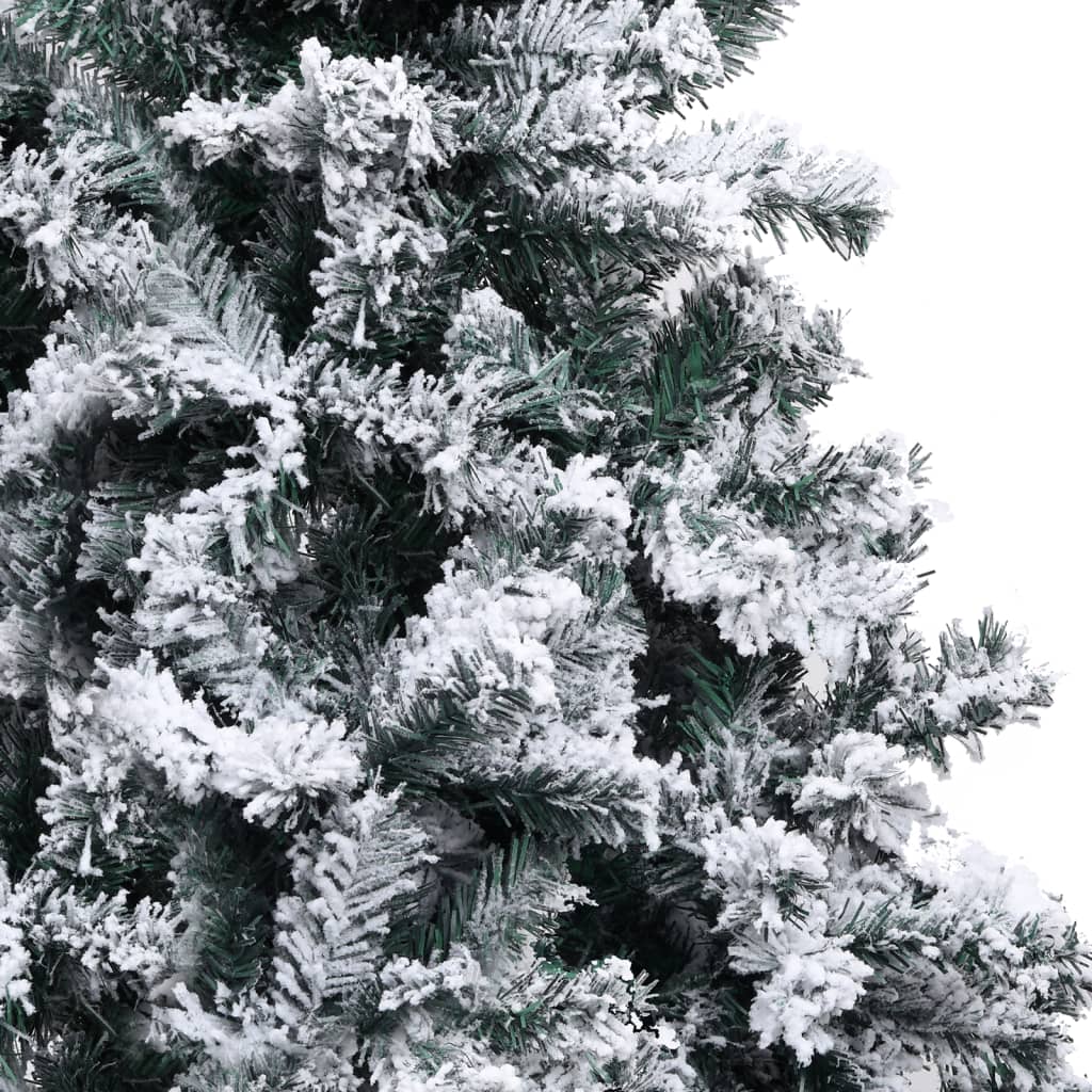 Affordable quality artificial Christmas tree with flocked snow, 300 cm in height, featuring lifelike PVC branches, close-up view.