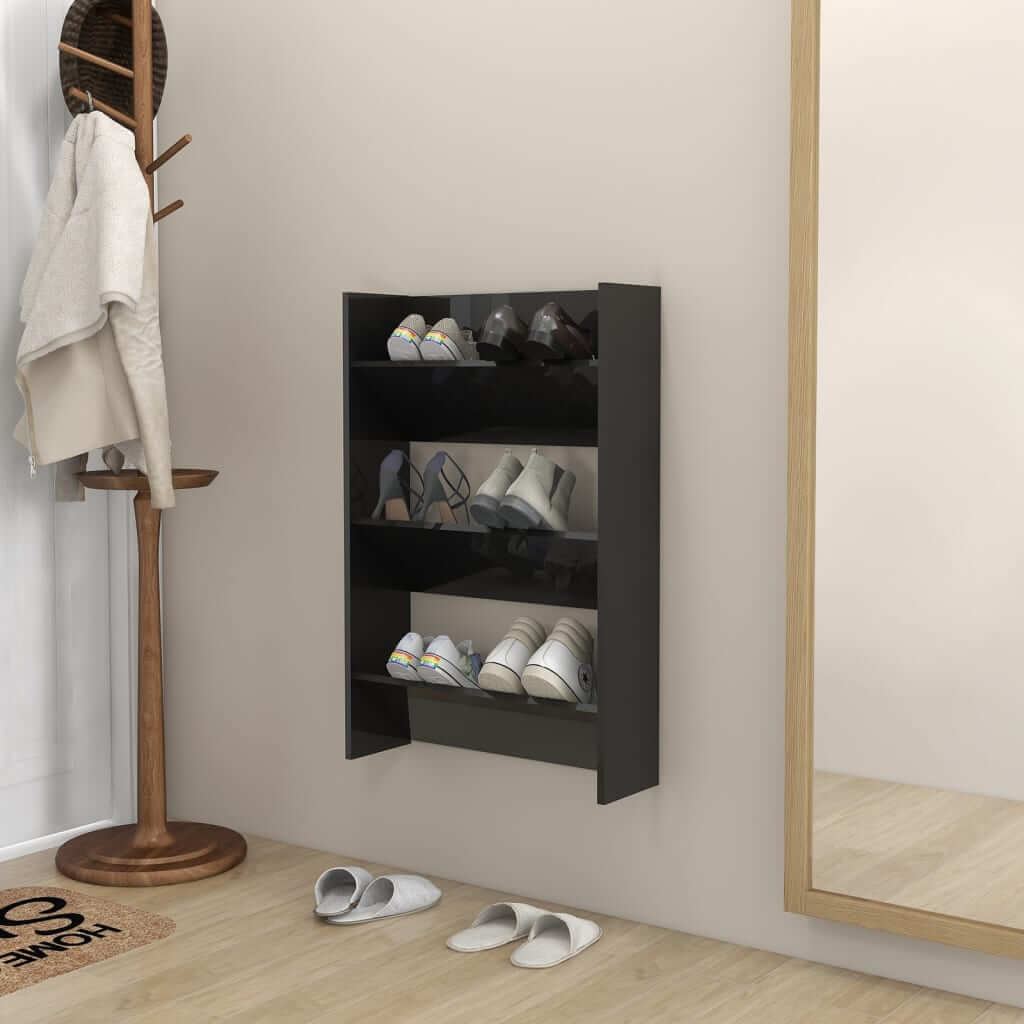 Wall-mounted black high gloss shoe cabinet with 3 shelves, displaying organized footwear. Stylish and affordable storage solution.