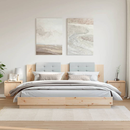 Modern bedroom featuring a wooden bed frame with two matching solid pine wood bedside cabinets for a stylish and organized space.