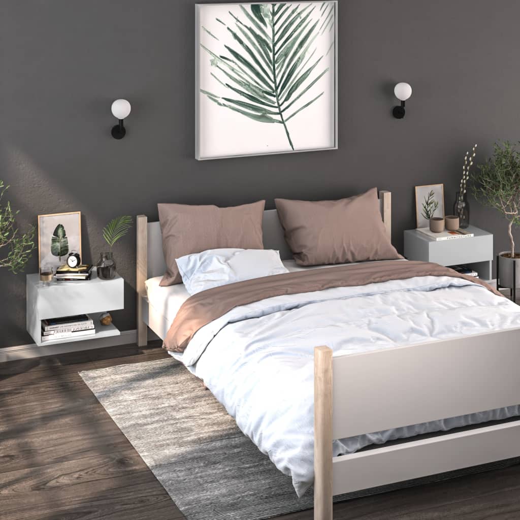 Modern bedroom with a bed and two white wall-mounted bedside cabinets, showcasing an affordable and quality storage solution.