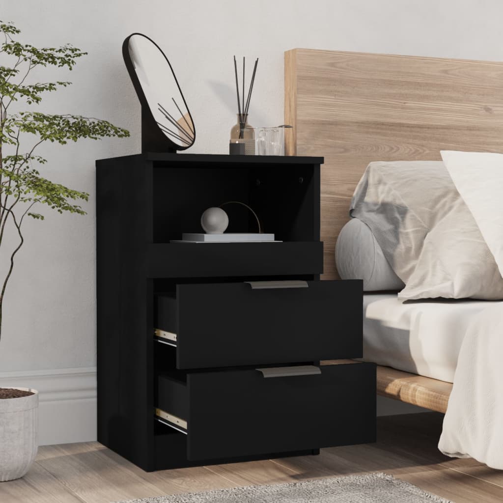 Affordable and quality black engineered wood bedside cabinet with 2 drawers and 1 compartment for ample storage next to a bed.