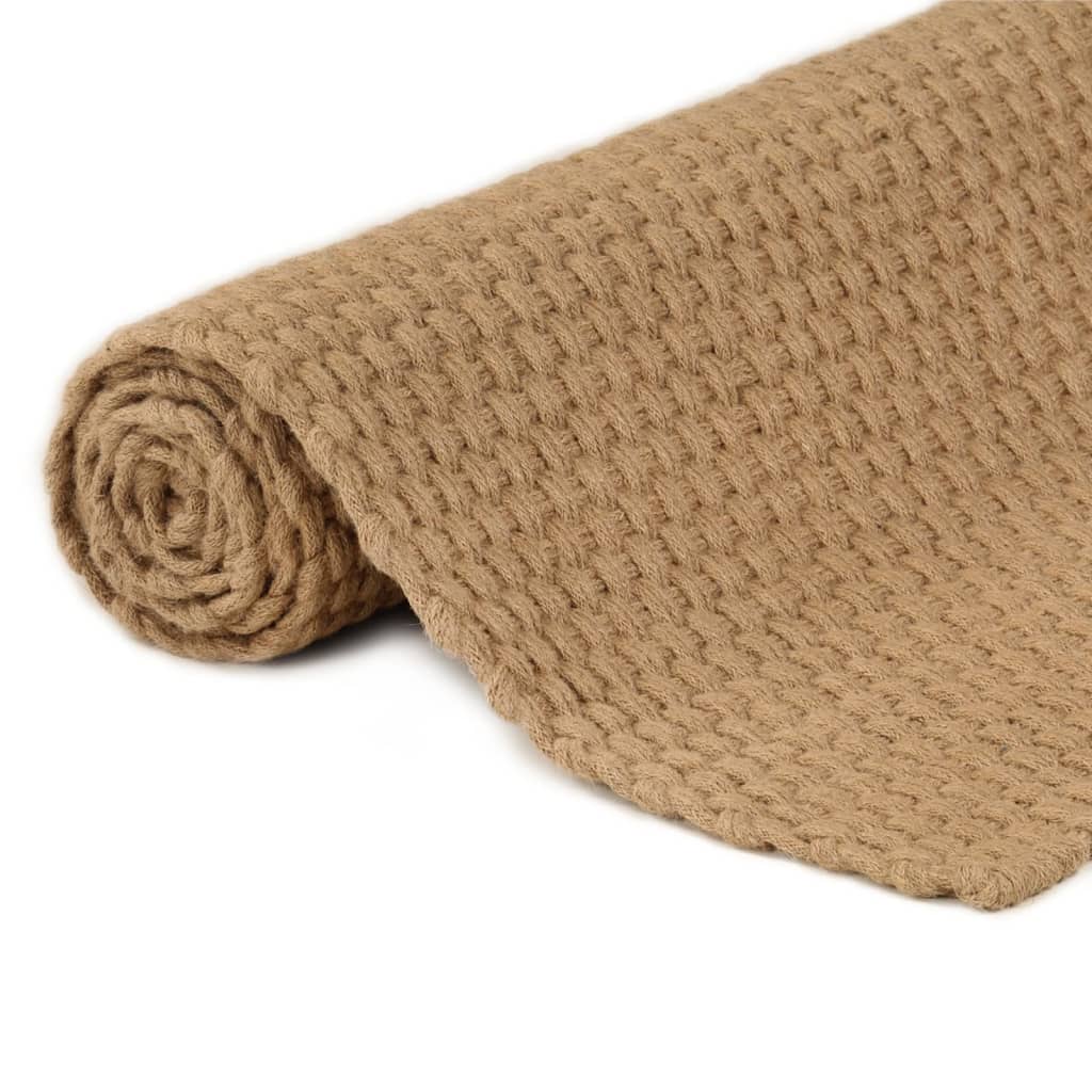 Rolled rectangular jute rug with a 2x2 rope knit pattern, showing a natural texture, 160x230 cm, ideal for stylish and affordable home decor.