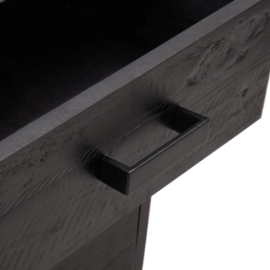 Close-up of black solid pinewood bedside cabinet drawer handle with a vintage industrial look.