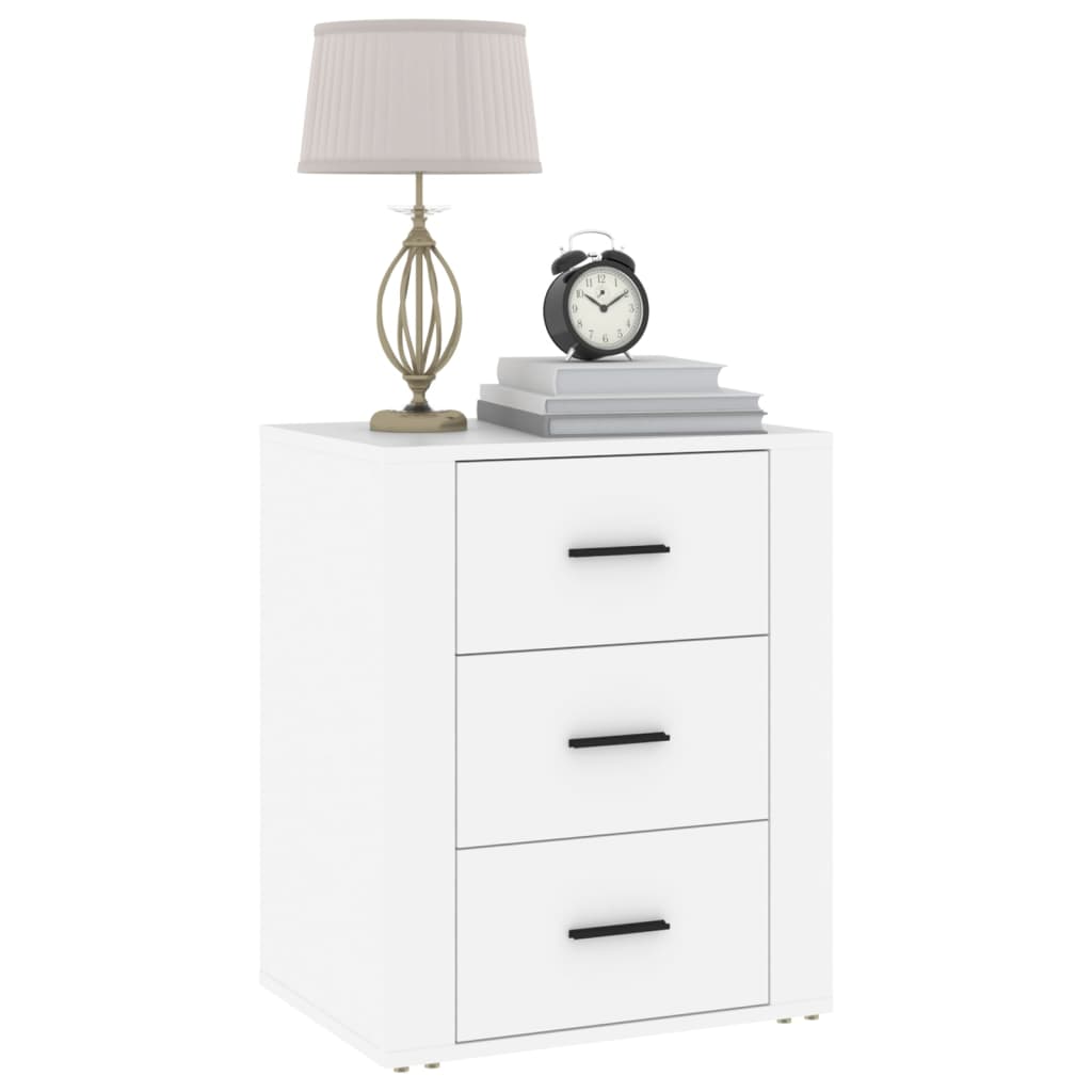 White bedside cabinet with 3 drawers, lamp, and clock on top, offering affordable, quality storage and value.