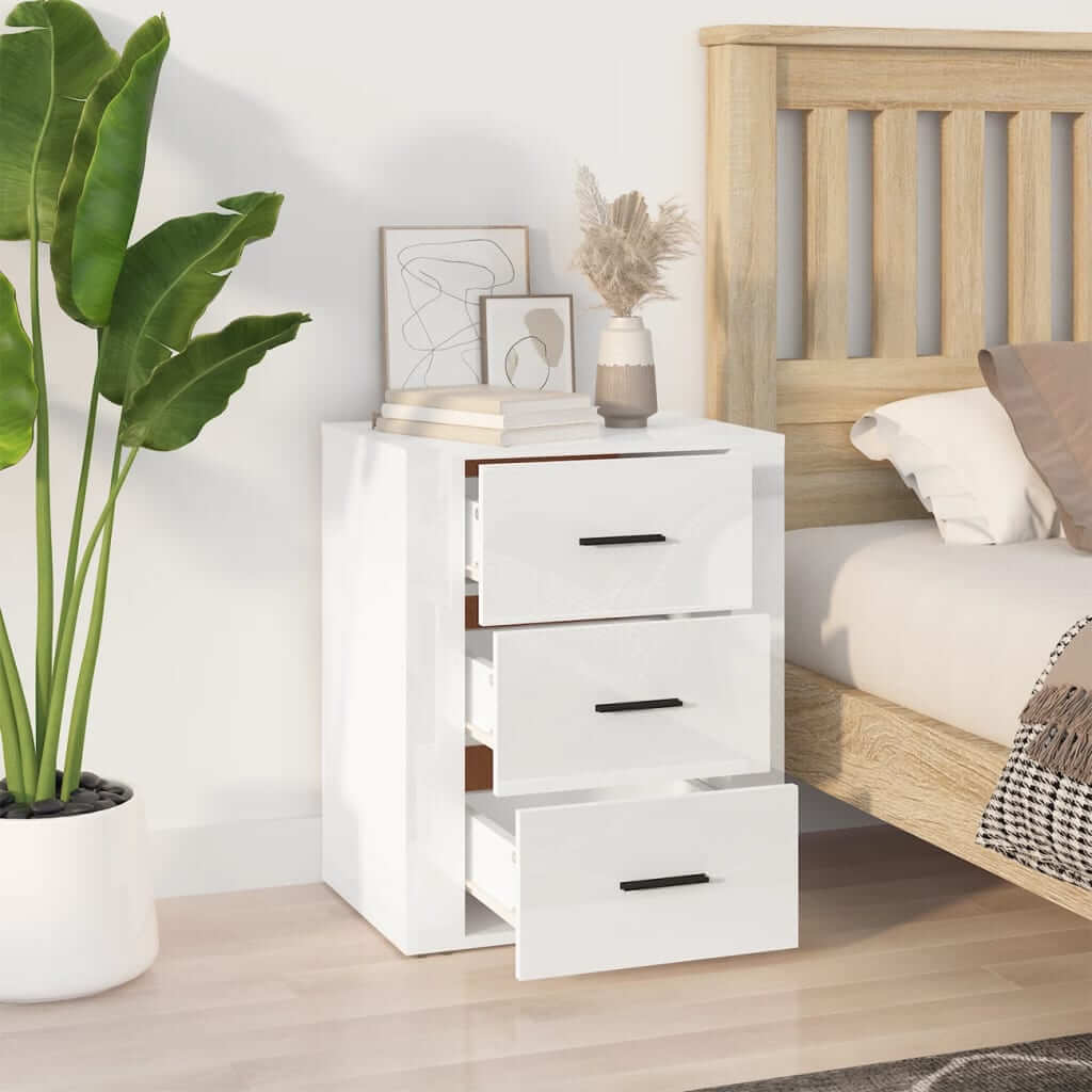 High gloss white bedside cabinet with 3 drawers, featuring sleek design and ample storage space for organized living, next to bed. Affordable quality.