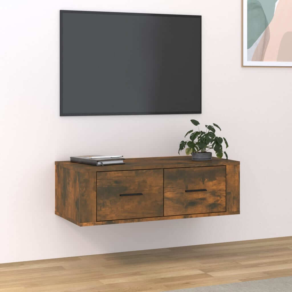 Affordable quality hanging TV cabinet in smoked oak finish with two drawers, mounted on a wall in a modern living room setting