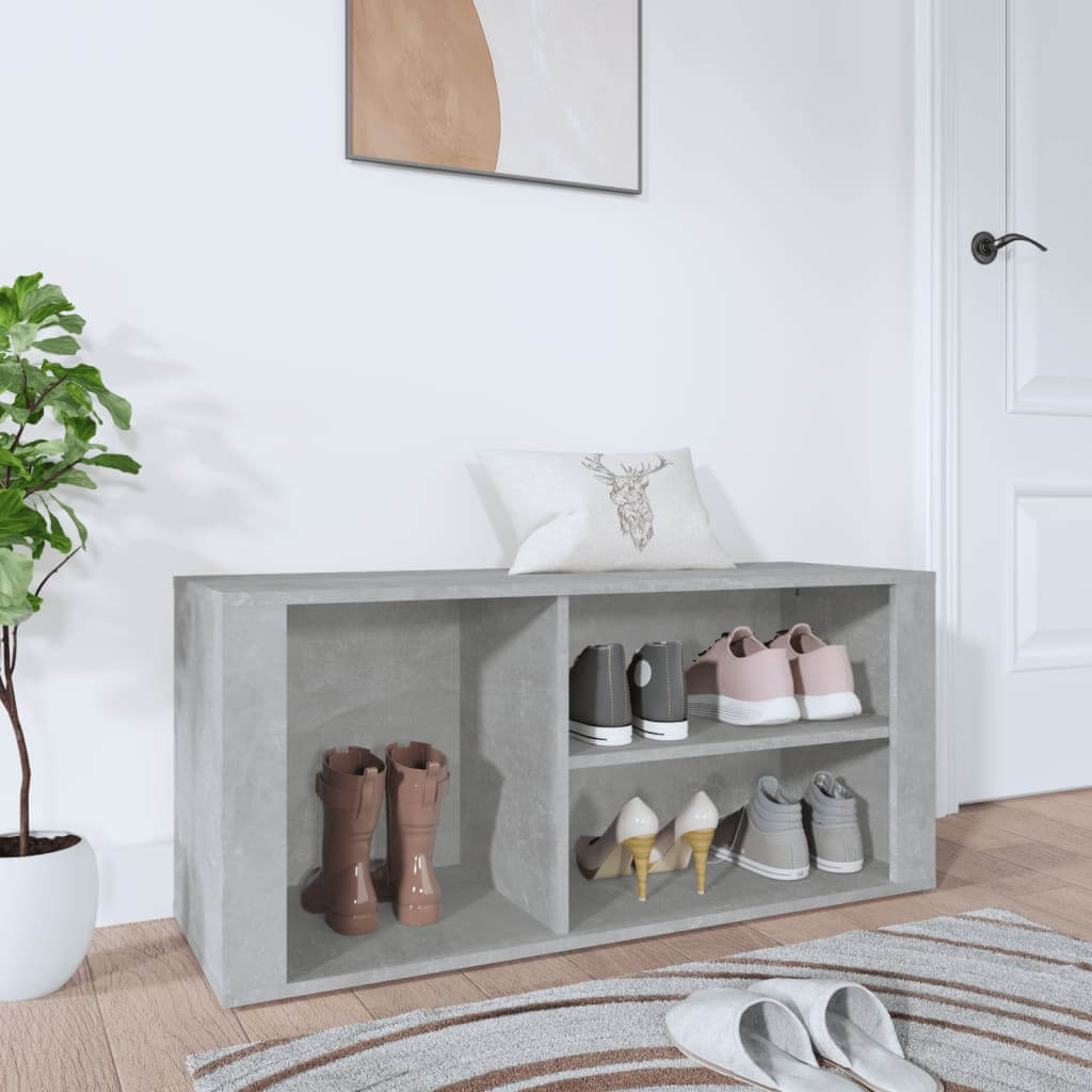 Concrete grey shoe cabinet with multiple shelves in elegant room, budget-friendly engineered wood, stores boots and shoes neatly.