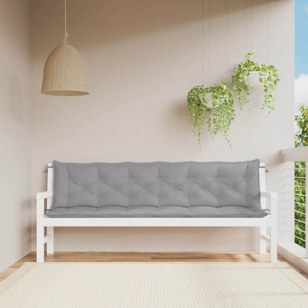 Grey garden bench cushions on white bench, 200x50x7cm, made of durable, water-resistant Oxford fabric. Affordable, quality outdoor seating.