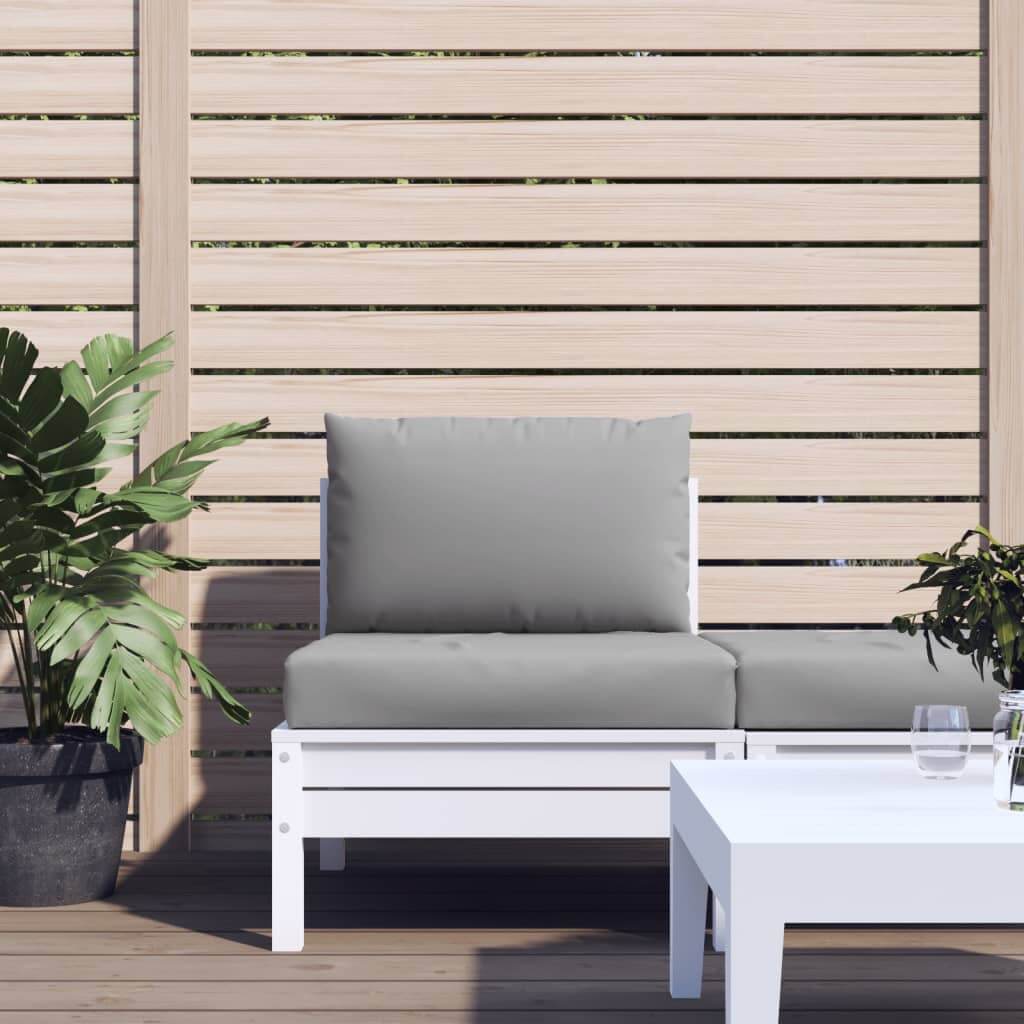 Grey pallet cushions on outdoor seating with plants and a white table, showcasing affordable quality Oxford fabric.