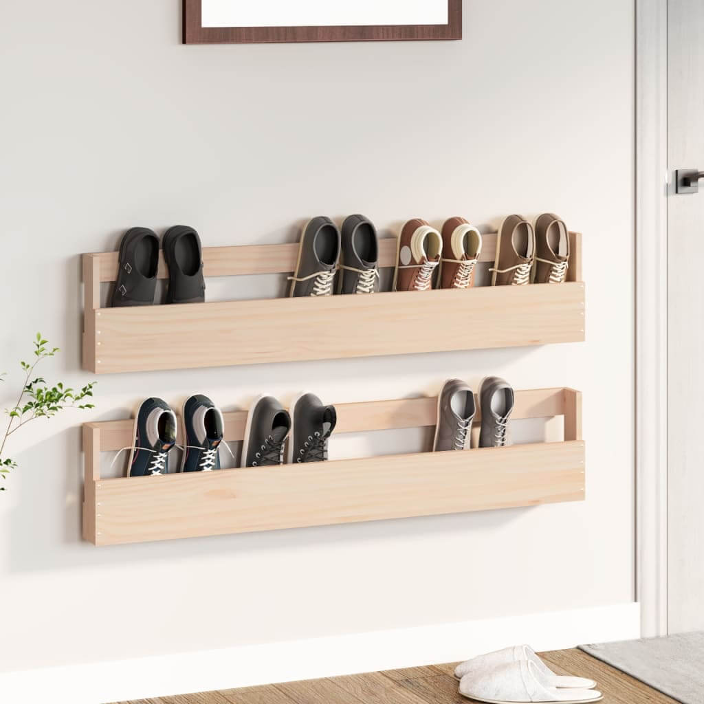 Wall-mounted shoe racks in solid pine wood holding six pairs of shoes, showcasing affordable and quality storage solutions.