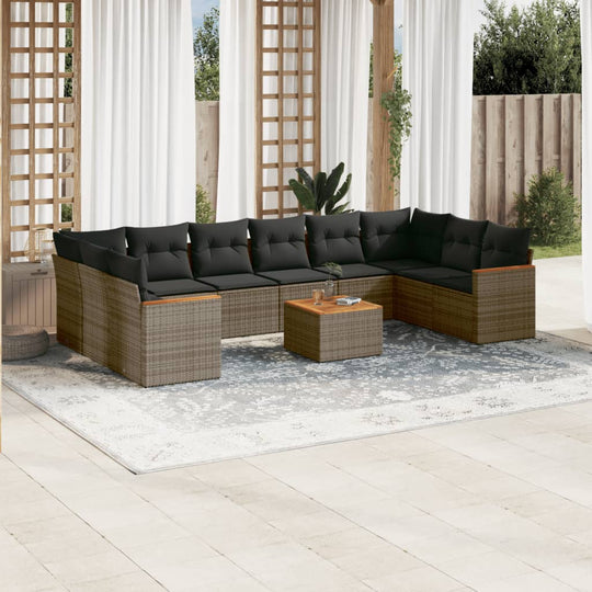 11 Piece garden sofa set with cushions in grey poly rattan, offering affordable luxury for outdoor spaces.