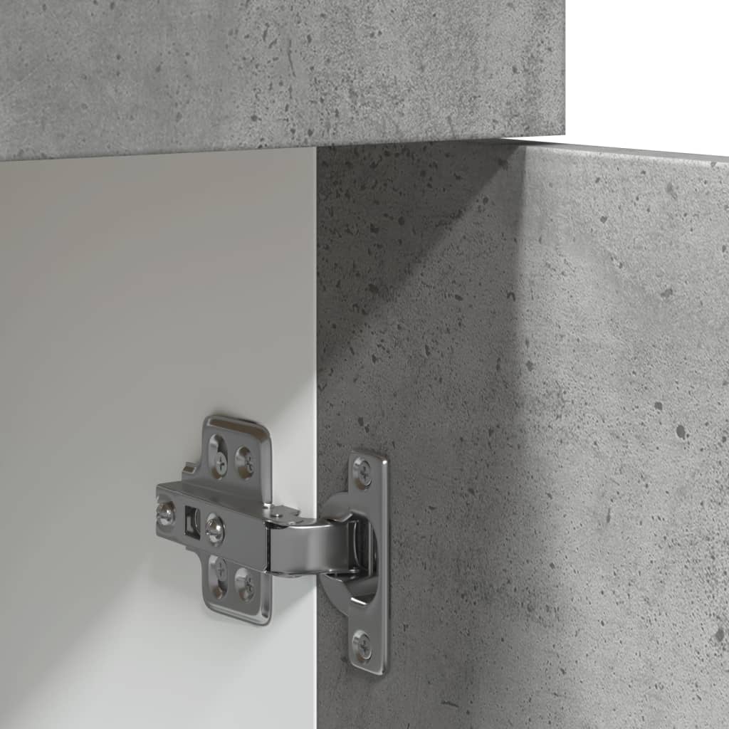 Close-up of the hinge on a concrete grey engineered wood drawer bottom cabinet, showcasing durability and quality.