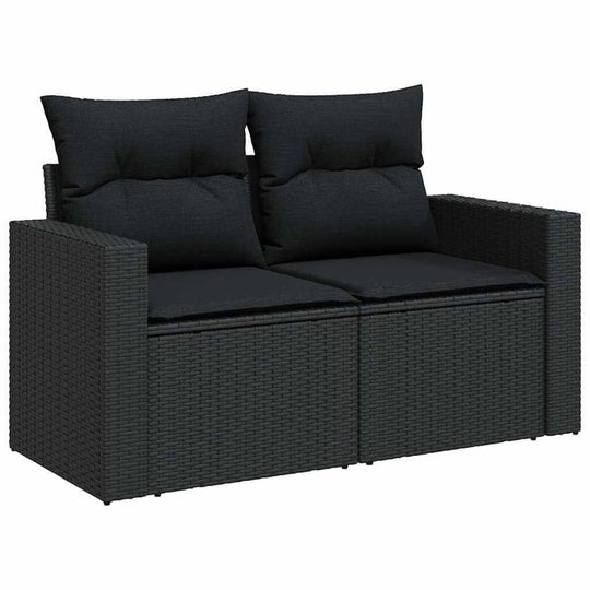 Black poly rattan garden sofa with cushions, ideal for affordable DIY outdoor furniture, offering quality and luxe comfort.