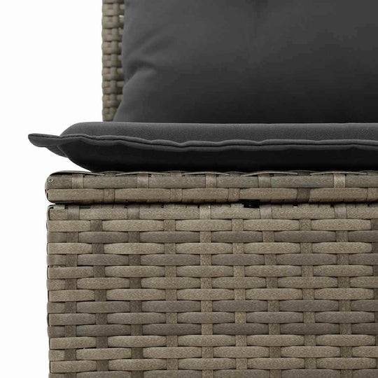 Close-up of grey poly rattan garden sofa with dark cushion, showcasing affordable, quality craftsmanship and luxe DIY style.