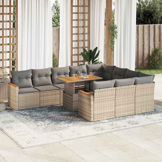 Beige poly rattan garden sofa set with cushions on a patio, featuring an acacia wood table. Affordable luxury for outdoor relaxation.