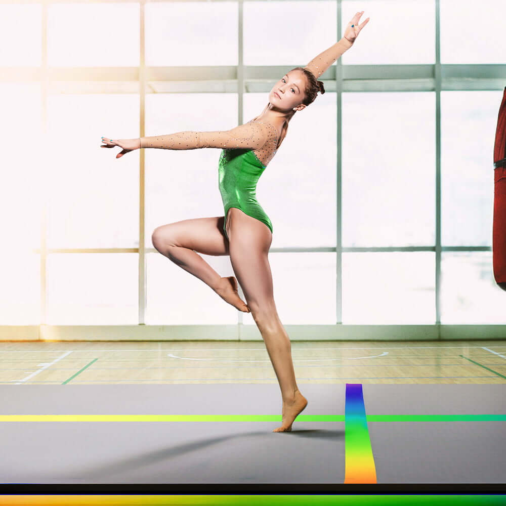 Gymnast performing on Everfit 3M Air Track Gymnastics Tumbling Mat, showcasing agility and grace in a bright gym setting.