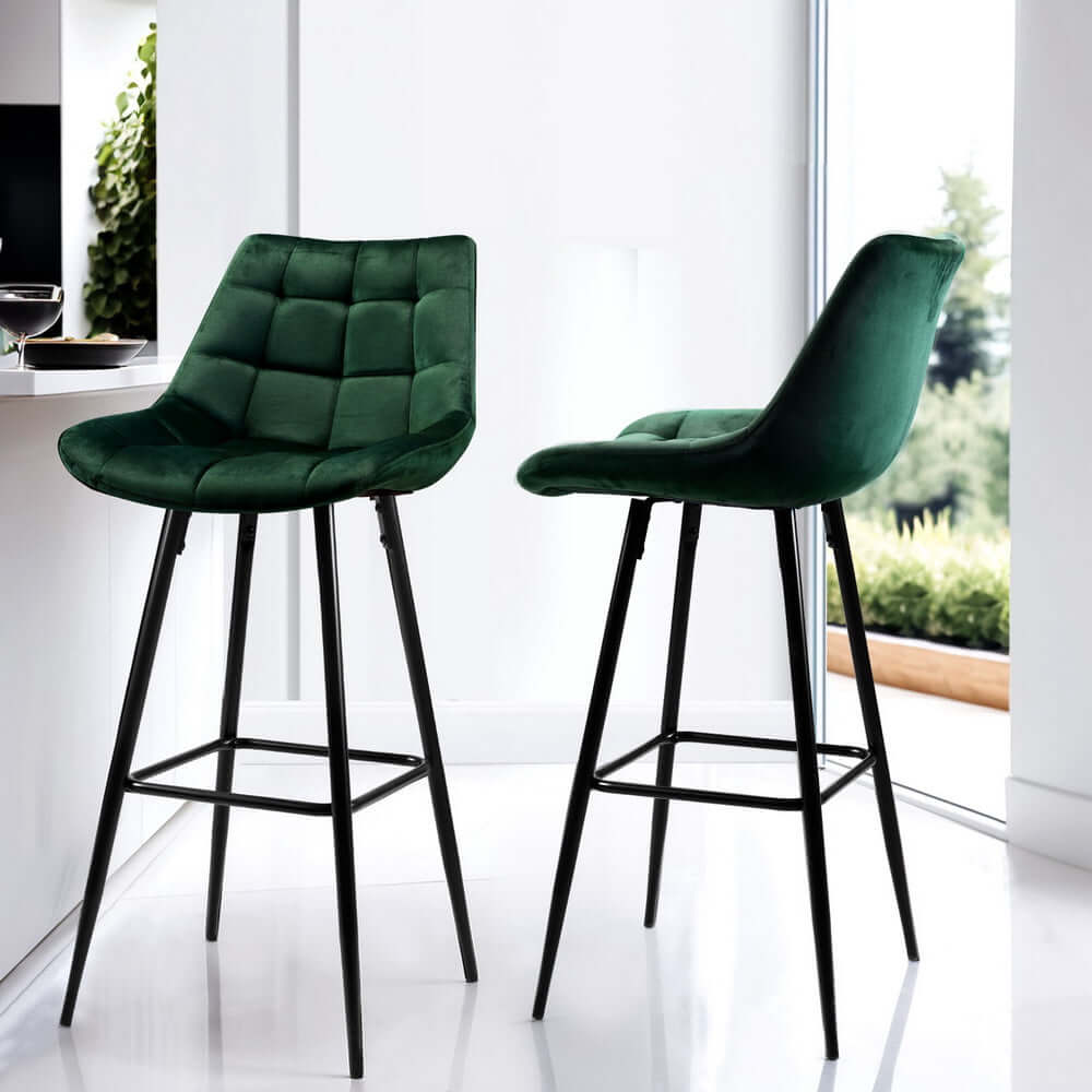 Artiss 4x affordable green velvet bar stools with chic black metal legs, offering quality and comfort in a modern setting.