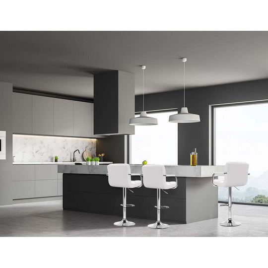 Modern kitchen featuring Artiss white leather gas lift bar stools with armrests, highlighting affordable luxury in design.