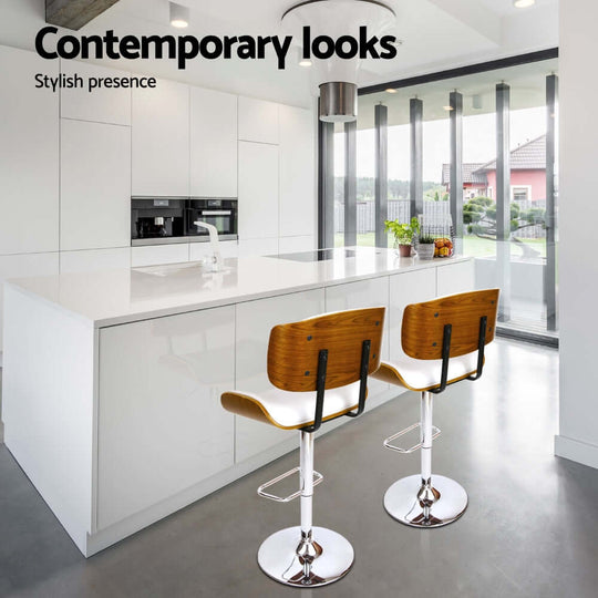 Affordable Artiss 4x bar stools with chrome base, PU leather seats, perfect for a modern kitchen decor.