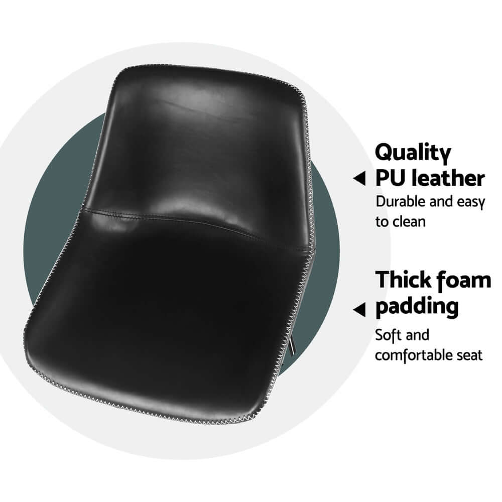 Close-up of black PU leather bar stool with thick foam padding, showcasing quality and easy maintenance.