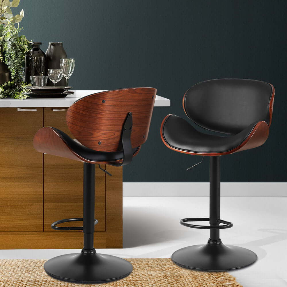 Artiss bar stools in black leather and wood, modern design with swivel gas lift; affordable luxury for any kitchen.