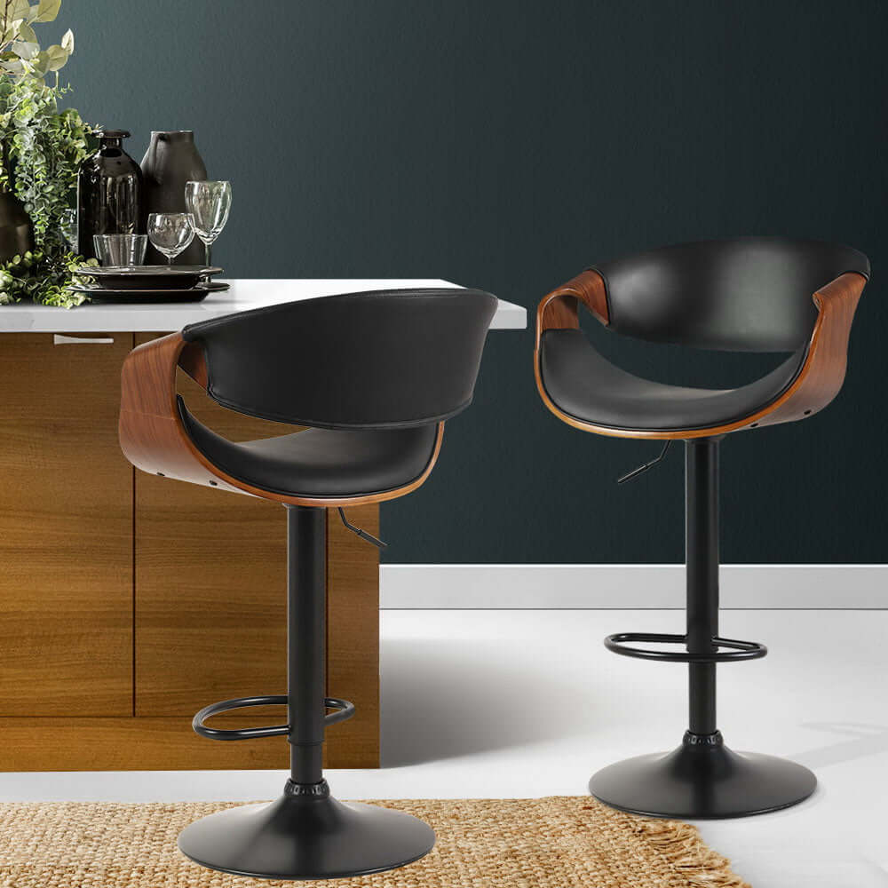 Artiss 2x bar stools with gas lift, leather seats, and armrests in modern kitchen setting, perfect for affordable luxury.