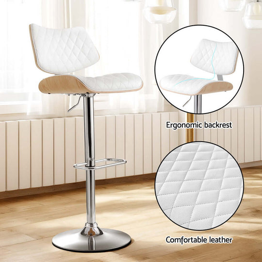 Artiss 2x bar stools featuring ergonomic backrest and comfortable leather upholstery for luxury dining.