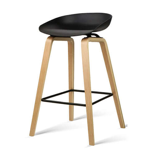 Affordable black wooden bar stool with a minimalist design, strong PP plastic seat, and sturdy metal footrest.