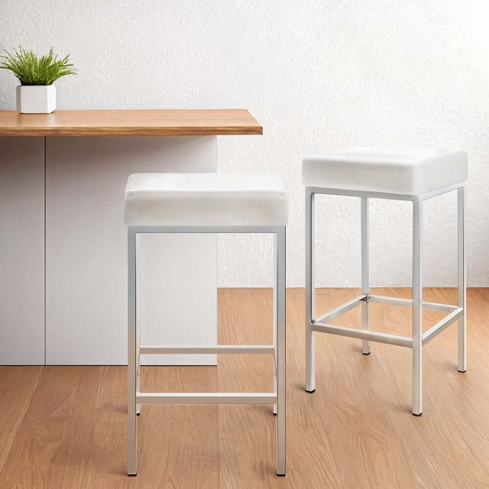 Artiss 4x white leather padded bar stools with chrome legs, affordable modern seating for stylish interiors.