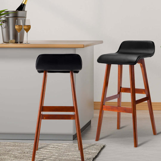 Affordable Artiss 4x Bar Stools with quality wooden frame and luxurious PU leather seats for stylish DIY spaces.