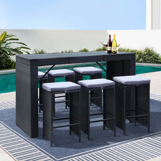 Affordable Gardeon 7-piece outdoor bar set with black wicker table and stools, perfect for stylish patio dining.